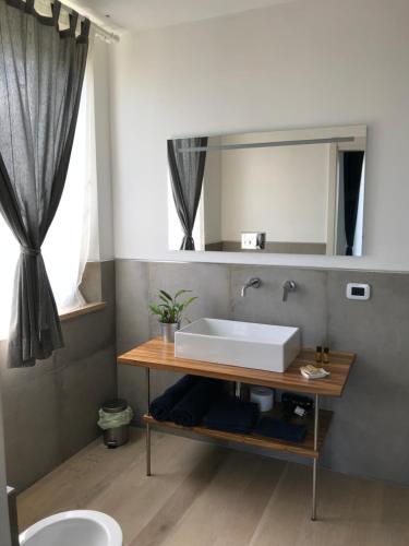 Ένα μπάνιο στο B&b Salsedine