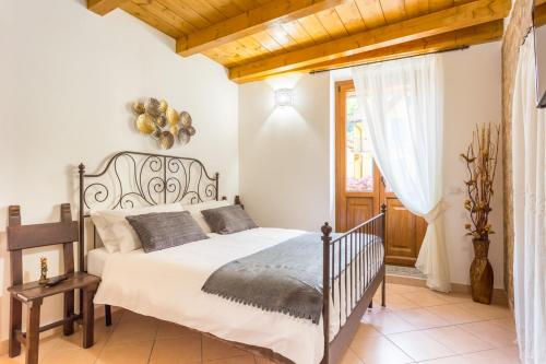 Guest House Casa del Folletto tesisinde bir odada yatak veya yataklar