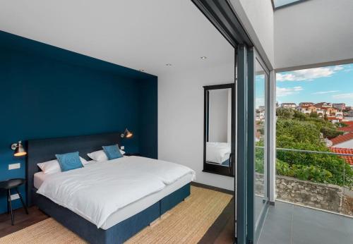 Postel nebo postele na pokoji v ubytování Hideaway Villa am Meer