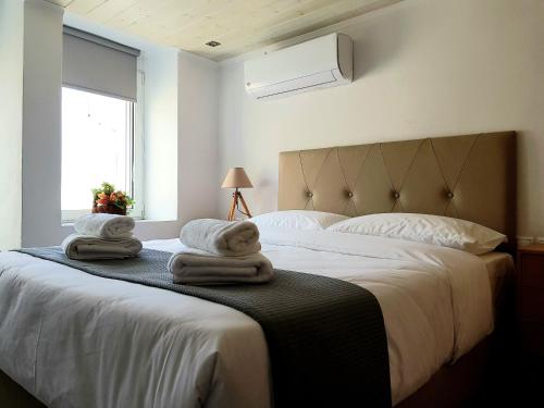 Ένα ή περισσότερα κρεβάτια σε δωμάτιο στο VILLA CHRYSI