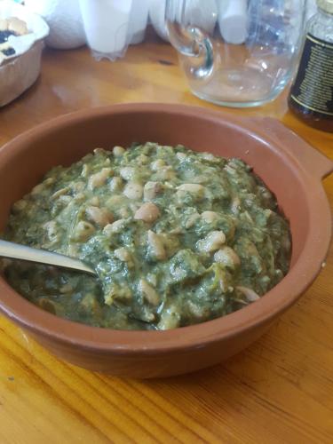 a bowl of food sitting on top of a table at Borgo Santa Lucia in Cropani
