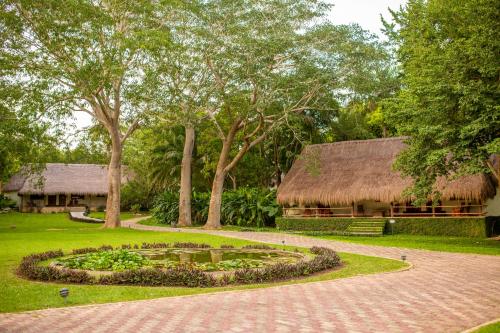 Jardín al aire libre en The Lodge at Chichen Itza