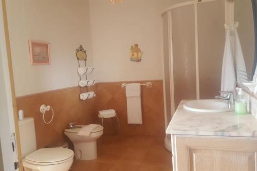 Ein Badezimmer in der Unterkunft Casa Familiar CD