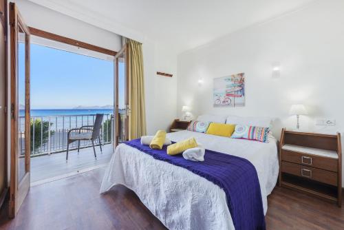 En eller flere senge i et værelse på Apartment Lauba