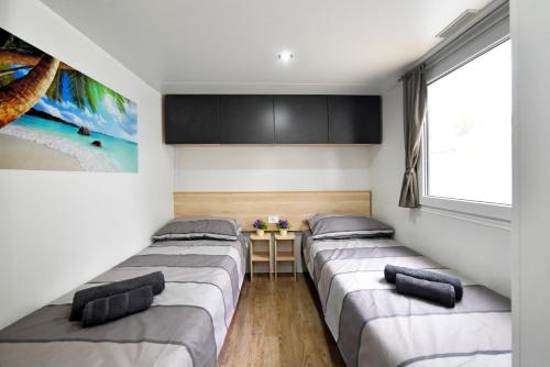 Krevet ili kreveti u jedinici u okviru objekta Mobile Home MeeLi Camp Soline