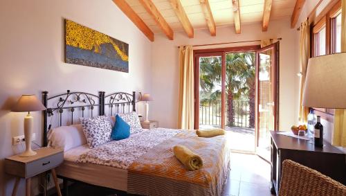 Llit o llits en una habitació de Villa Sampoli - Agroturismo Son Sampoli - Adults only