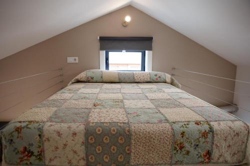A bed or beds in a room at ESTUDIO REAL 8