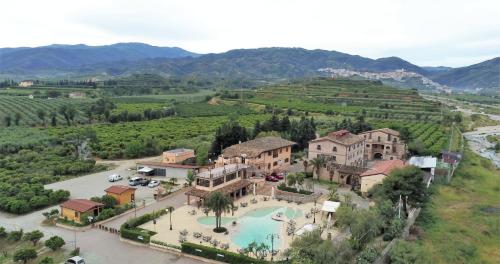 an aerial view of a house with a swimming pool at Relais Il Mulino in Corigliano Calabro