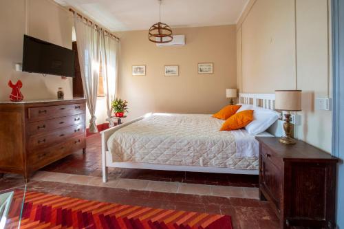 Postel nebo postele na pokoji v ubytování Agriturismo Villa Cavallini