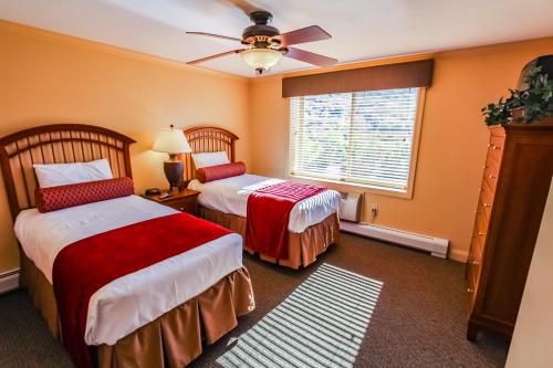 מיטה או מיטות בחדר ב-InnSeason Resorts Pollard Brook