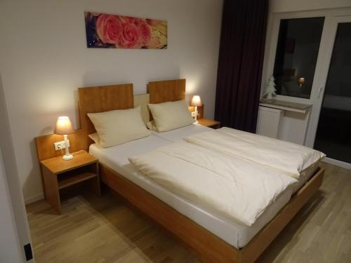 Ένα ή περισσότερα κρεβάτια σε δωμάτιο στο Aktiv Hotel Winterberg