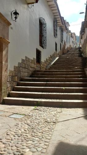 a set of stairs leading up to a building at Casa De Mama Cusco - The Treehouse in Cusco