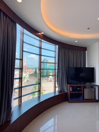 TV a/nebo společenská místnost v ubytování Quốc Thanh Hotel