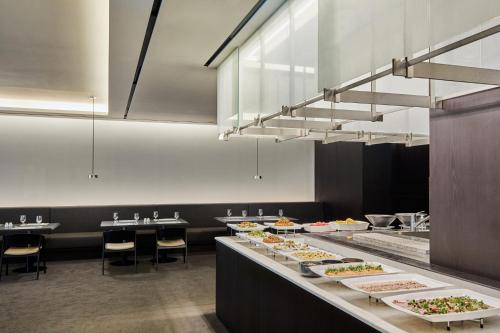 a buffet line with many plates of food at Phoenix Hotel Pyeongchang in Pyeongchang 