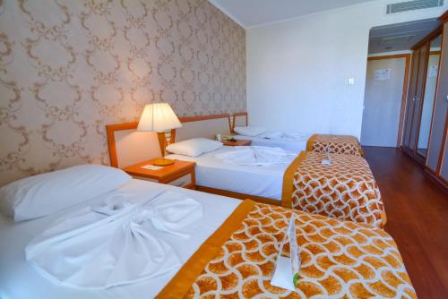 Ein Bett oder Betten in einem Zimmer der Unterkunft Pine House by Werde Hotels