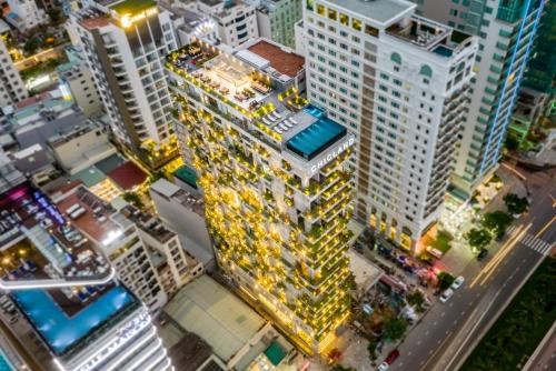 an overhead view of a city with tall buildings at Chicland Boutique Danang Beach Hotel in Da Nang