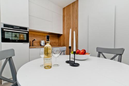 Η κουζίνα ή μικρή κουζίνα στο BlueApart Apartamenty Jurata