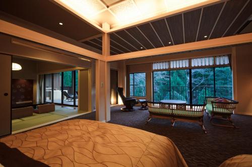 Postel nebo postele na pokoji v ubytování Kyo Yunohana Resort Suisen