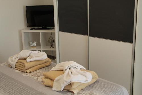 Postel nebo postele na pokoji v ubytování Korcula Apartments Iliskovic