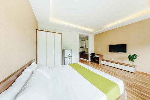 Ένα ή περισσότερα κρεβάτια σε δωμάτιο στο Hana 1 Apartment & Hotel Bac Ninh