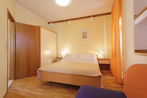 Posteľ alebo postele v izbe v ubytovaní Apartments Kovac Old Town