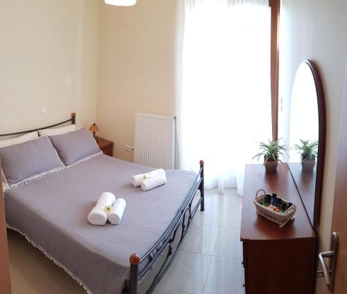 Postel nebo postele na pokoji v ubytování Sharon's Stone Villa