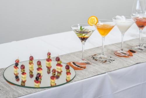 a plate of fruit and drinks on a table at Glam Hotel Nairobi - Near Westgate Mall, Westlands in Nairobi