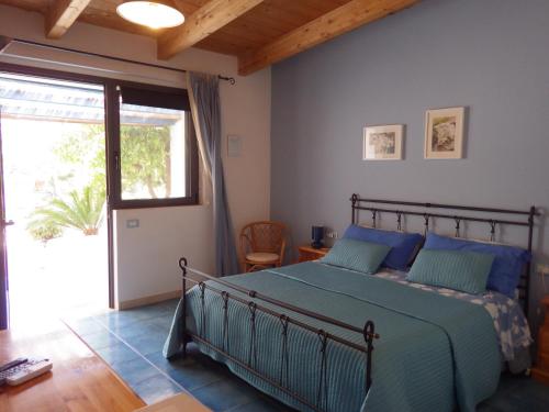 Postel nebo postele na pokoji v ubytování B&B Masseria Liberatore