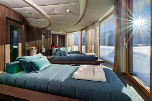 a bedroom with two beds on a boat at Wellnessresidenz Schalber in Serfaus