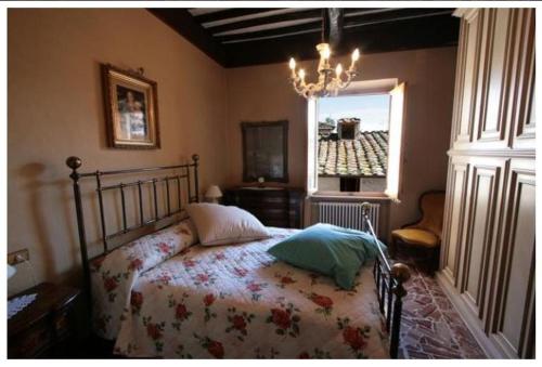 Una cama o camas en una habitación de La Torre Useppi