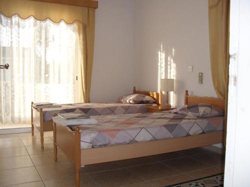 Llit o llits en una habitació de Villa Theodora