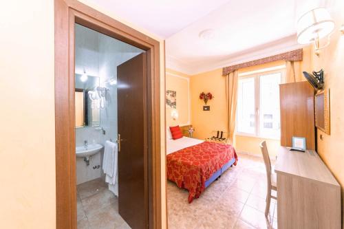 Downtown Accommodation tesisinde bir odada yatak veya yataklar