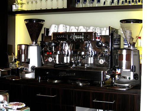 a counter with a blender on top of it at Konoba in Meckenheim