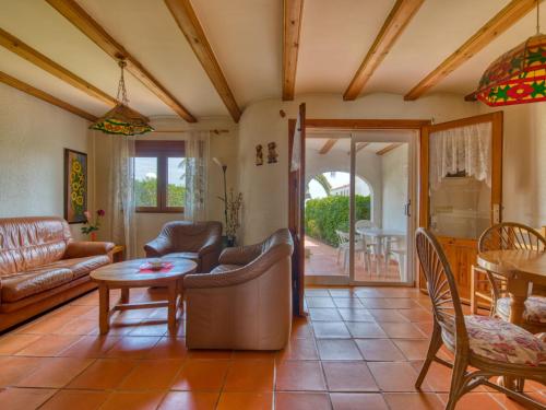a living room with a couch and a table at Holiday Home Montanar Plus-1 by Interhome in Jávea
