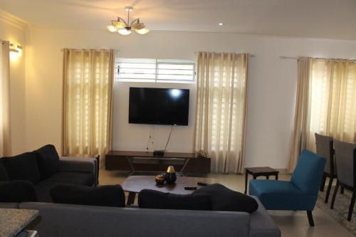 Μια τηλεόραση ή/και κέντρο ψυχαγωγίας στο The Avery Apartments, Dzorwulu