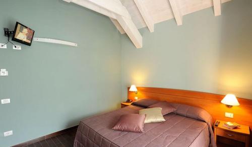Кровать или кровати в номере Residence Villa Maurice