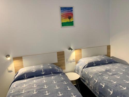 Postel nebo postele na pokoji v ubytování Edifici Valeria