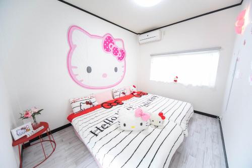 Ein Bett oder Betten in einem Zimmer der Unterkunft Miraie Yokkaichi Tomida