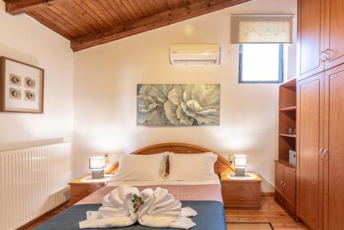 Ένα ή περισσότερα κρεβάτια σε δωμάτιο στο Vilkas Home