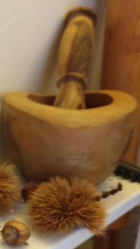 a bowl sitting on top of a table with two balls at B&B Il Balcone sul Lago in Brunate
