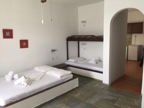 En eller flere senger på et rom på Villa Lula