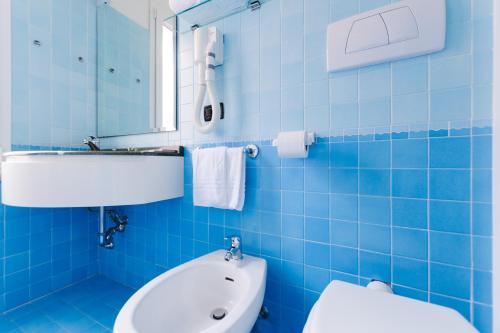 Koupelna v ubytování Hotel Fra I Pini