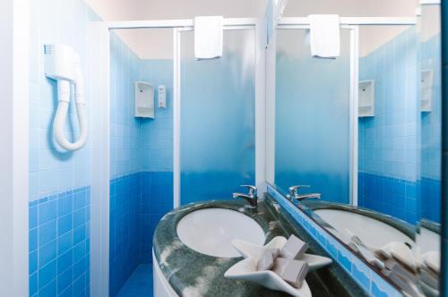 Kúpeľňa v ubytovaní Hotel Fra I Pini