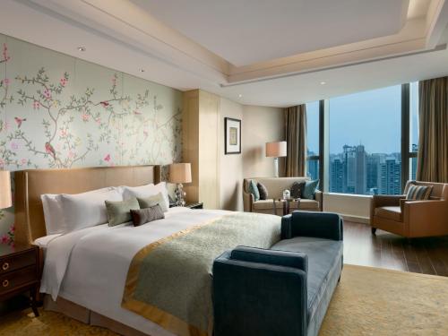 Postel nebo postele na pokoji v ubytování Kempinski Hotel Xiamen