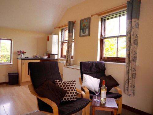 O zonă de relaxare la Swallow Cottage at Duffryn Mawr Cottages