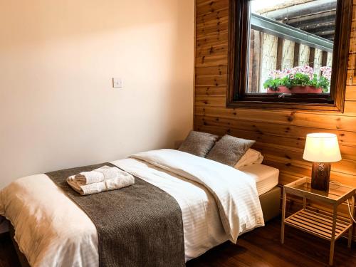 Postel nebo postele na pokoji v ubytování Vasiliou House Krimenos
