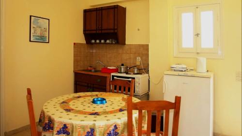 Η κουζίνα ή μικρή κουζίνα στο Makris Apartments