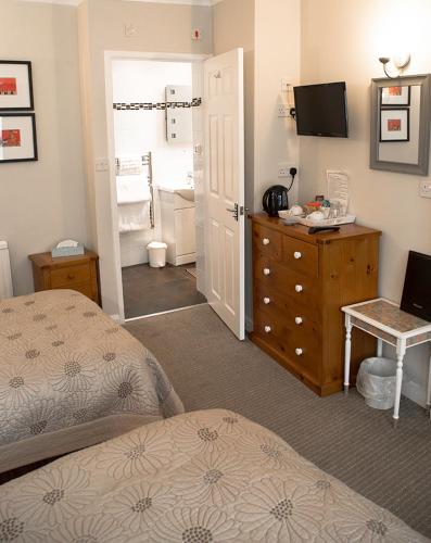 Cama ou camas em um quarto em Canterbury House