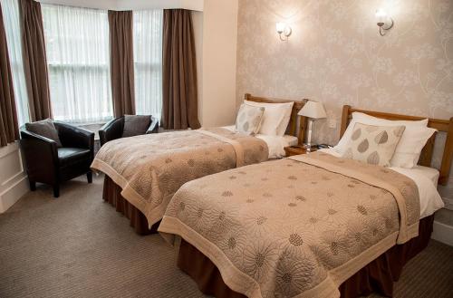 Cama ou camas em um quarto em Canterbury House