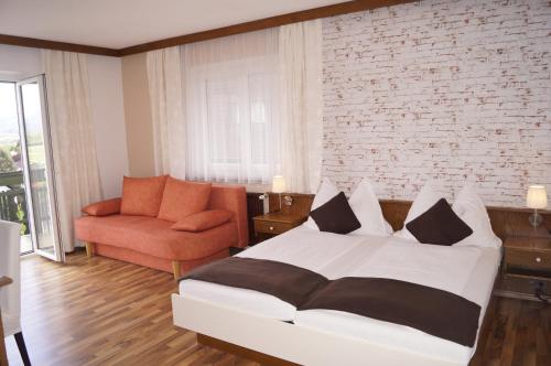 A bed or beds in a room at Pension DOBERNIG - CONTACTLESS CHECK IN/STAY